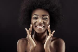 a women cleaning her face